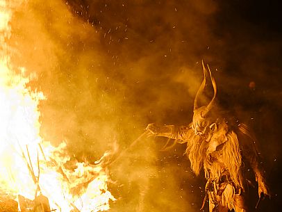 Krampus and St Nicholas, the tradition of 5 December in Tarvisio. Here in the mining village of Cave del Predil Krampus and St Nicholas, the tradition of 5 December in Tarvisio. Here in the mining village of Cave del Predil