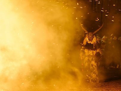 Krampus and St Nicholas, the tradition of 5 December in Tarvisio. Here in the mining village of Cave del Predil Krampus and St Nicholas, the tradition of 5 December in Tarvisio. Here in the mining village of Cave del Predil