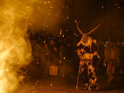 Krampus and St Nicholas, the tradition of 5 December in Tarvisio. Here in the mining village of Cave del Predil Krampus and St Nicholas, the tradition of 5 December in Tarvisio. Here in the mining village of Cave del Predil