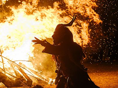 Krampus and St Nicholas, the tradition of 5 December in Tarvisio. Here in the mining village of Cave del Predil Krampus and St Nicholas, the tradition of 5 December in Tarvisio. Here in the mining village of Cave del Predil
